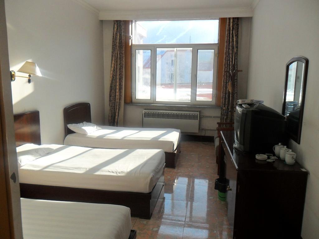 Yabuli Xintong Hotel Shangzhi Quarto foto