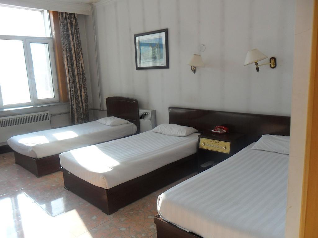 Yabuli Xintong Hotel Shangzhi Quarto foto